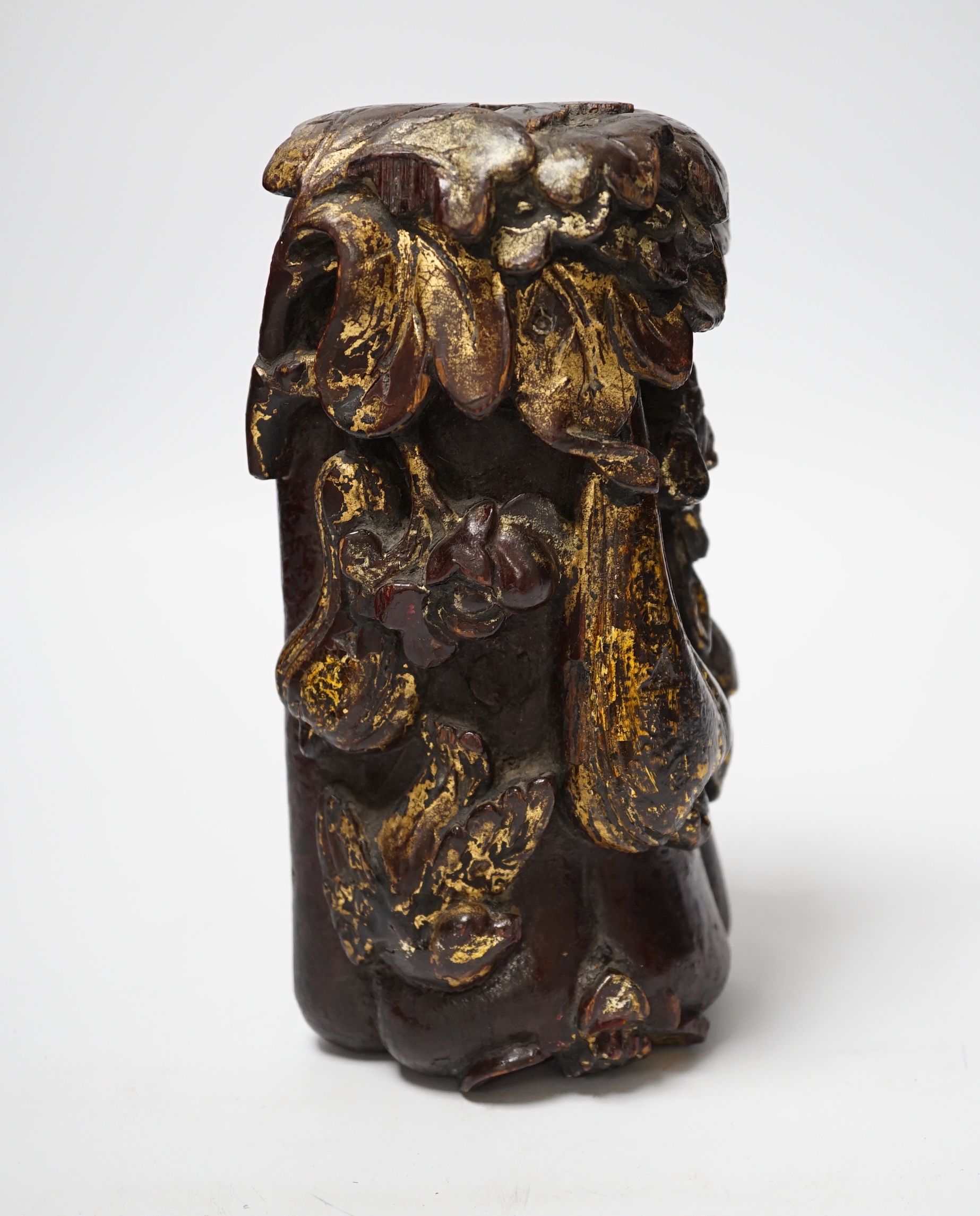 A Chinese lacquered wood fruit carving, late Qing dynasty, 20cm high